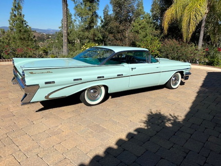 1 1959 Pontiac Bonneville passenger side